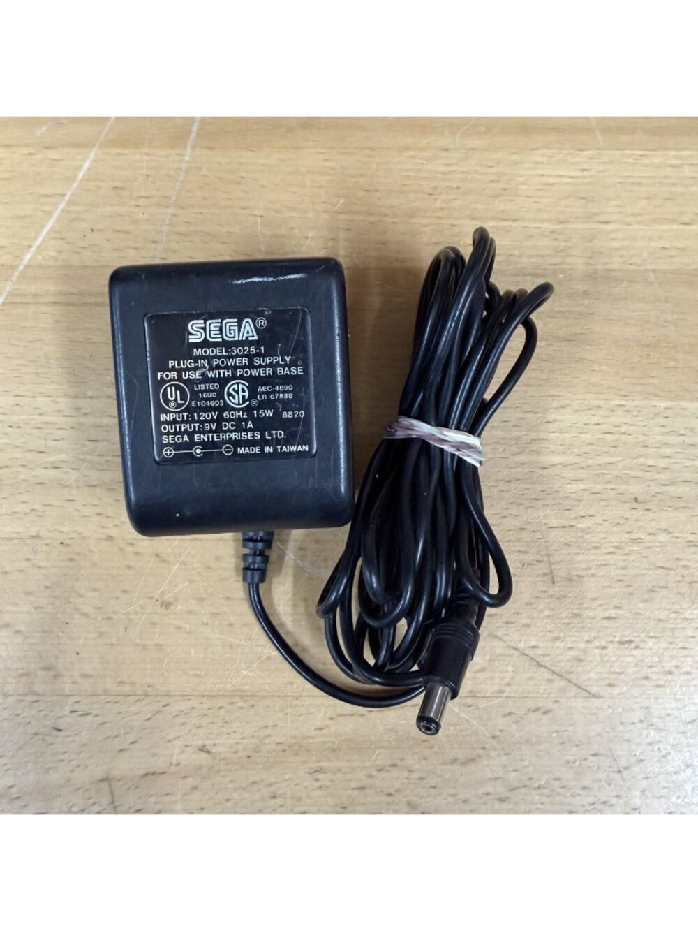 Sega 3025-1 plug-in power supply adapter for Base Black Barrel-style DC plug